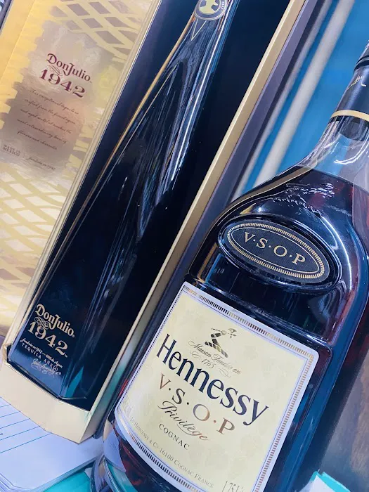1454 LIQUORS MART INC 4